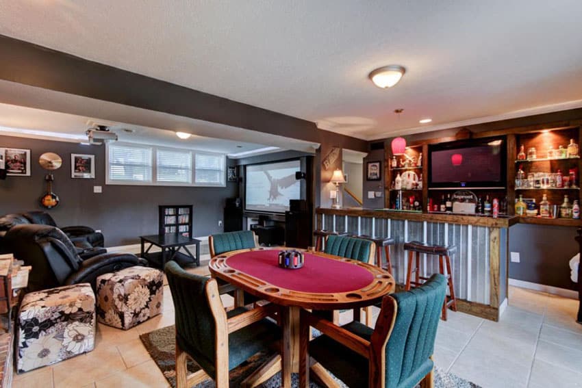 Basement man cave with leather seats tv home bar and card table