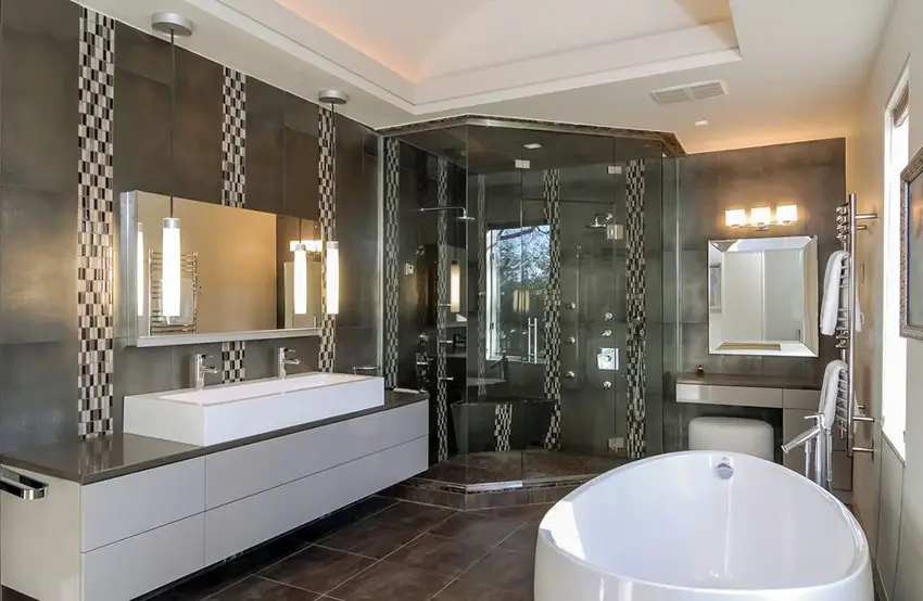 Bathroom with tray ceiling with hidden lighting