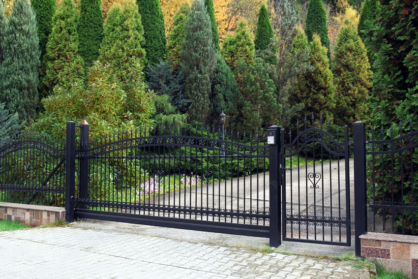 Black metal security fence and gate