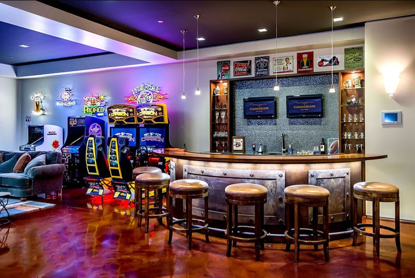 Circular man cave home bar with arcade games