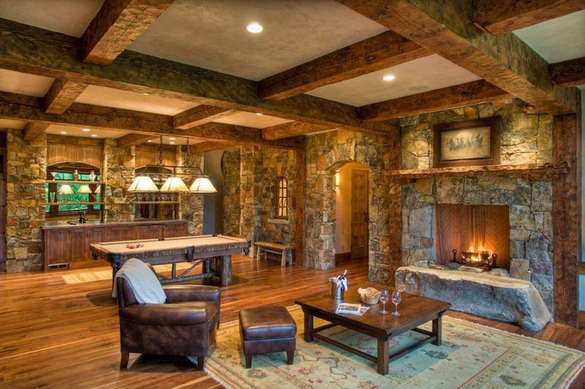 Craftsman style lounge with stone finishes and leather furnishings