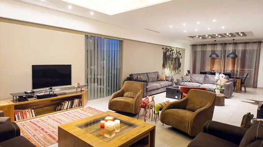 Decorated apartment living room in Africa with brown furniture