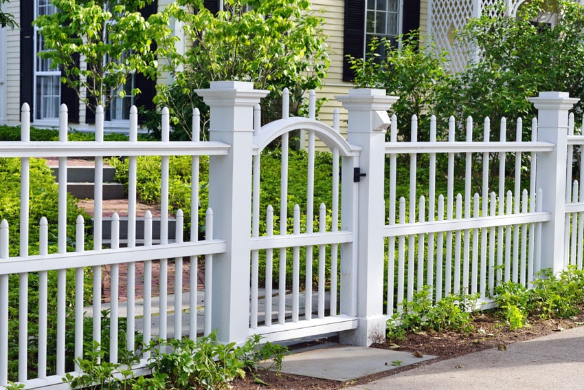 Decorative fence painted white