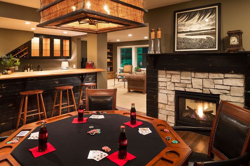 Game room with card table and rustic home bar