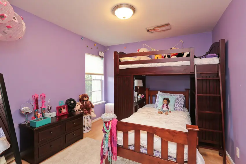 Girls bedroom with bunk bed purple walls