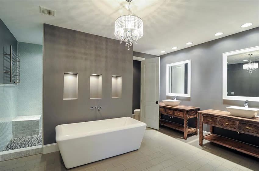 Gray master bathroom with drum chandelier