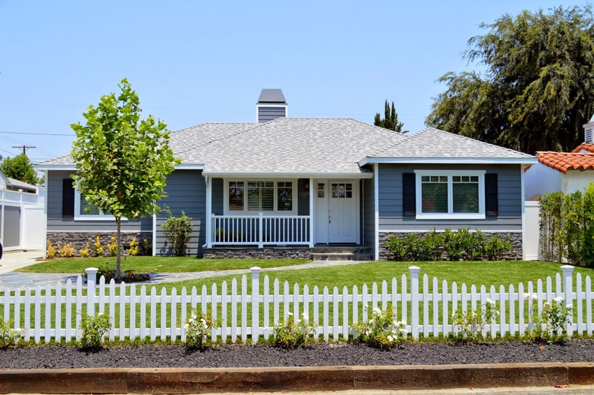 House with pretty white picket post fence
