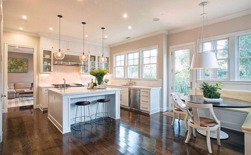 Kitchen with bar and stools