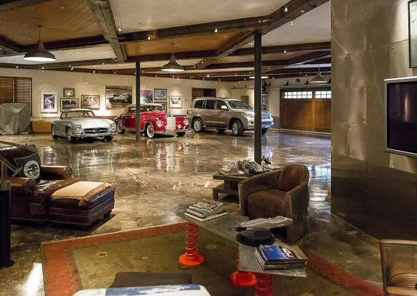 Garage with lounge chairs and tv