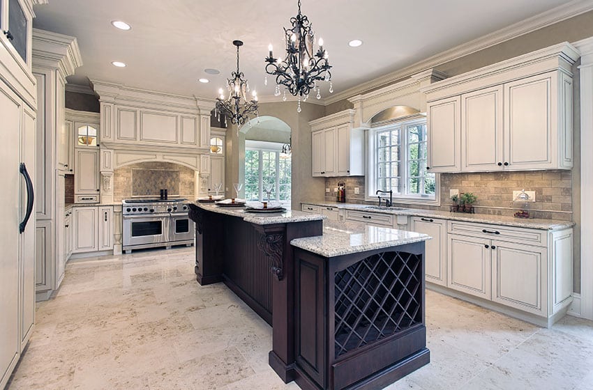 Luxury kitchen with antique white cabinet paint, long wood island with white granite counter