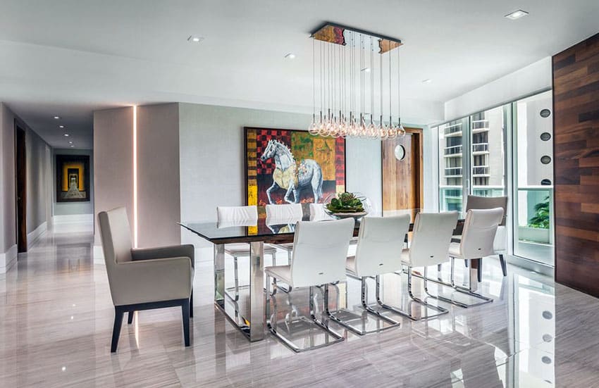 Luxury modern dining room with porcelain tile floors and multiple pendant light fixture