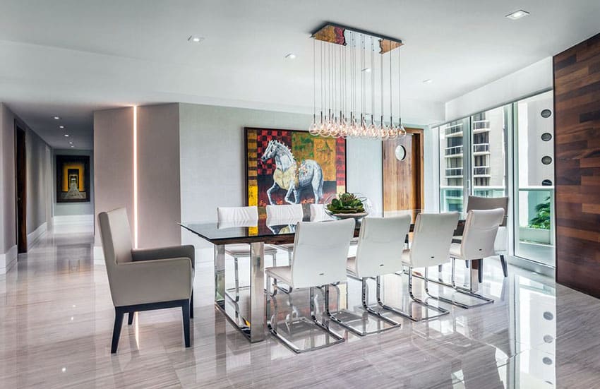 luxury modern dining rool with porcelain tile floors and multiple pendant light fixture