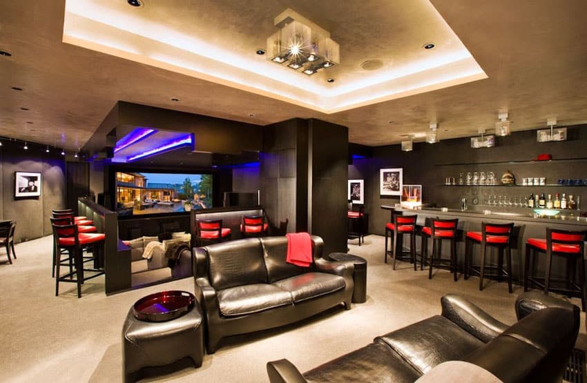 Luxury modern home interior with black leather furniture and stylish bar