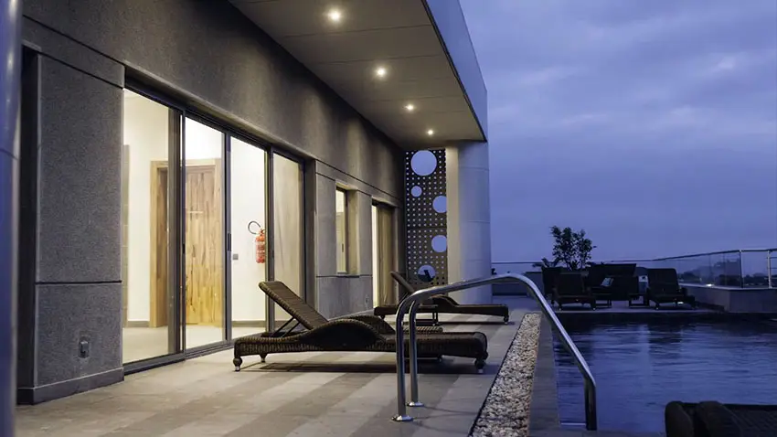 Luxury rooftop apartment swimming pool at night