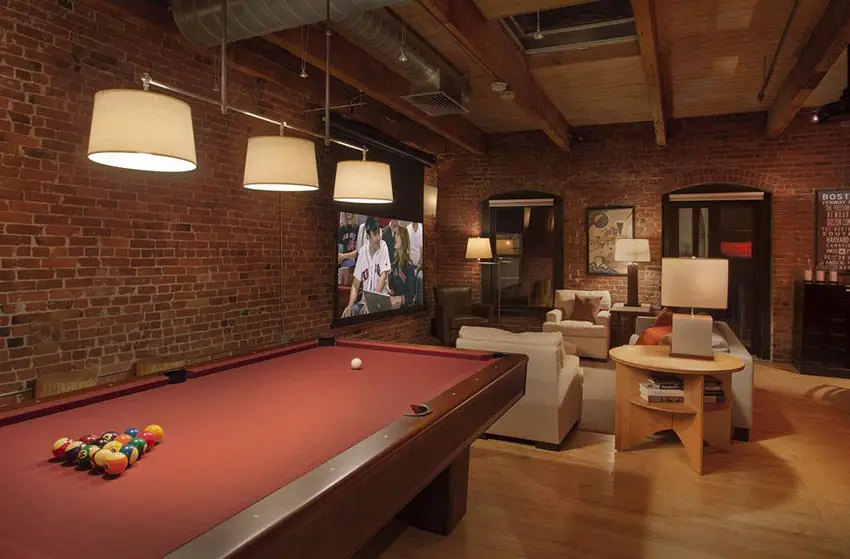 Loft with pool game and brick walls