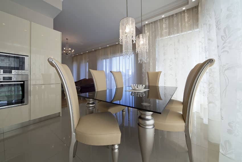 Beige room with glossy off white laminate cabinets