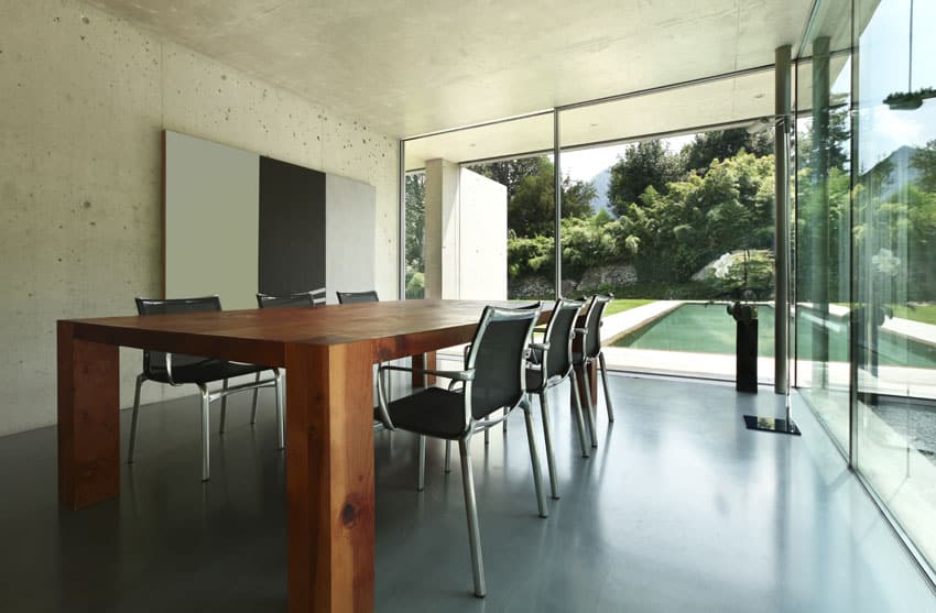 Industrial concrete room with thick table