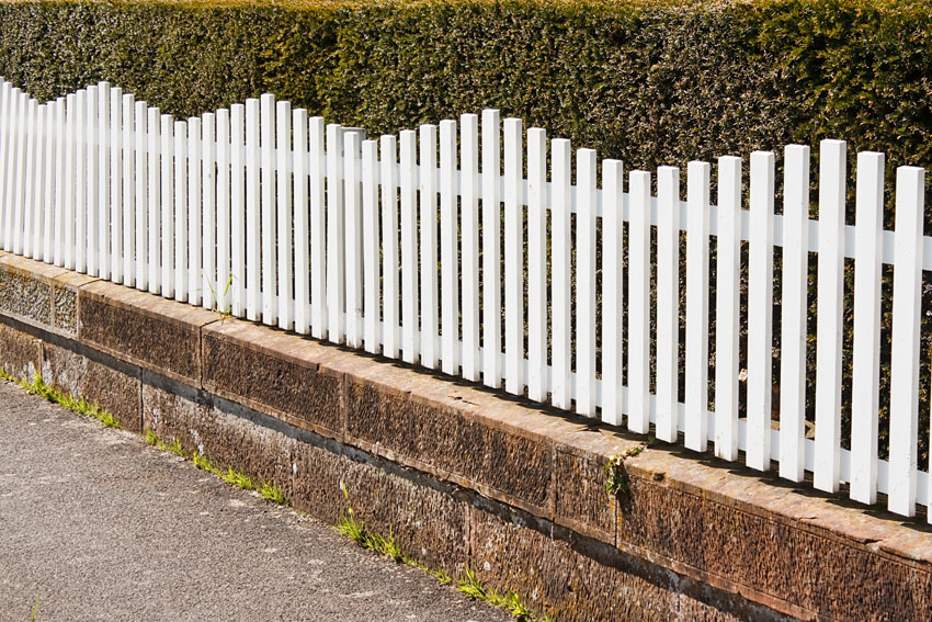 Modern white picket fence