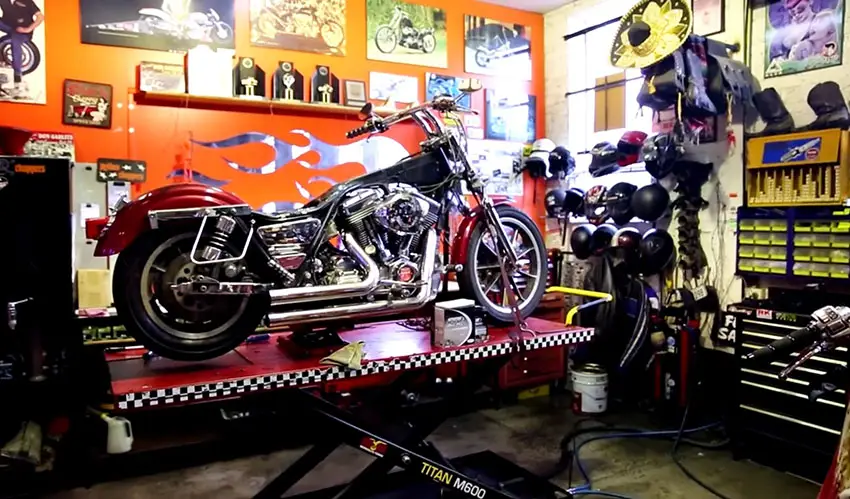 Mechanics garage with tools and motorcycle