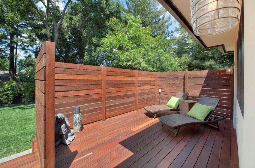 Redwood privacy fence around wood deck