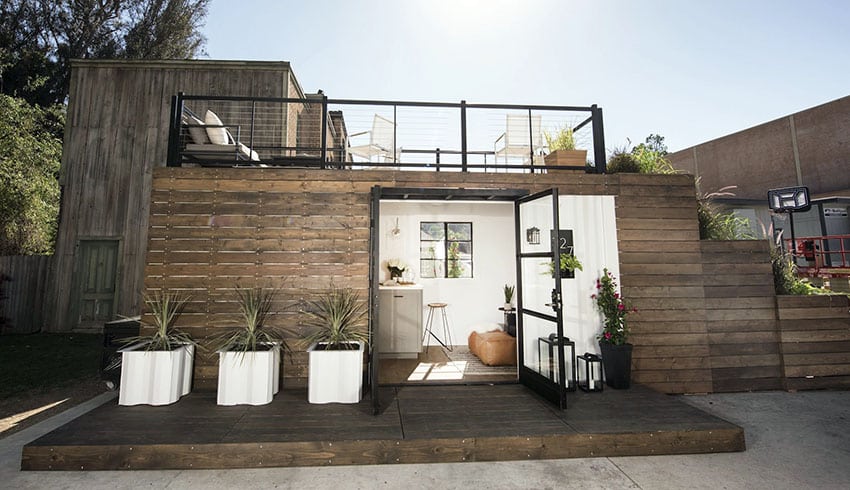 Shipping container lounge with wood exterior