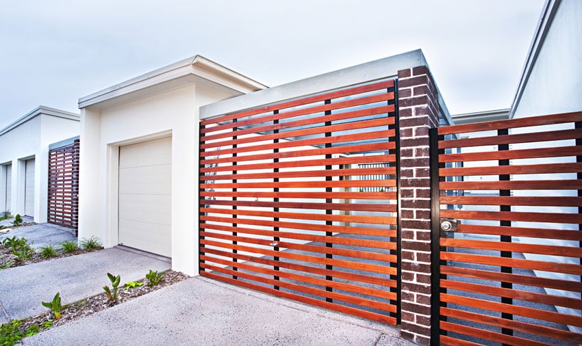 Modern horizontal fence at entry to home