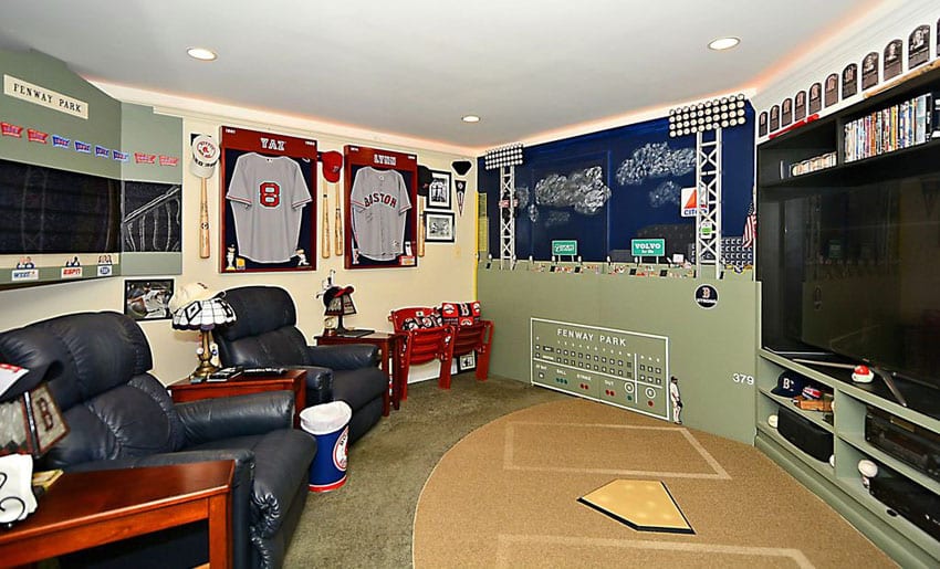 Sports man cave with recliner seats and tv