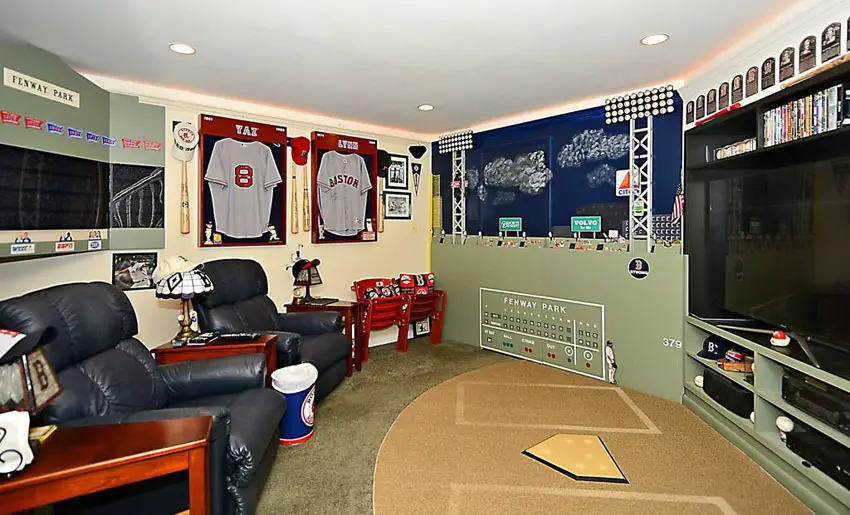 Sports-styled room with recliner seats and tv