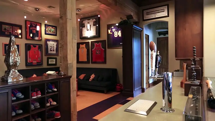 sports-man-cave-with-team-jerseys-and-beer-tap-17