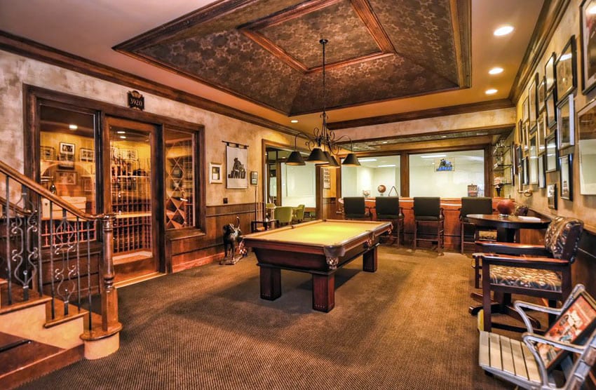 Traditional game room with wood bar and wine cellar