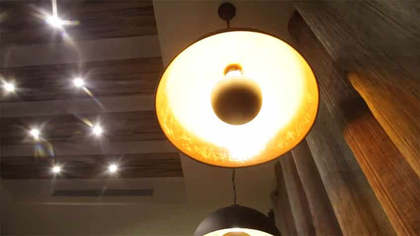 View of hanging lighting and recessed lights above dining table