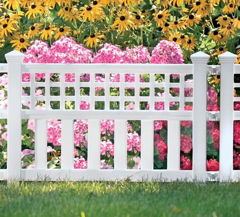 White resin fence in garden