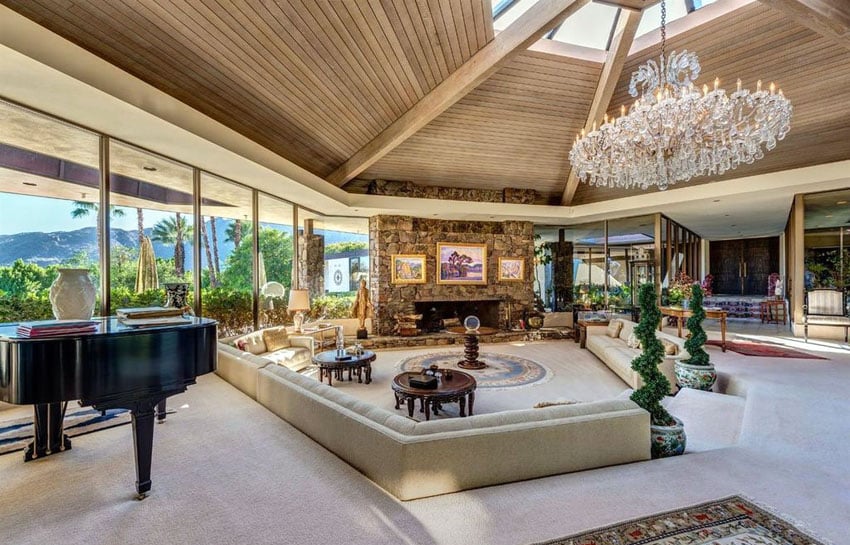 Great room with beadboard ceiling, skylights and chandelier