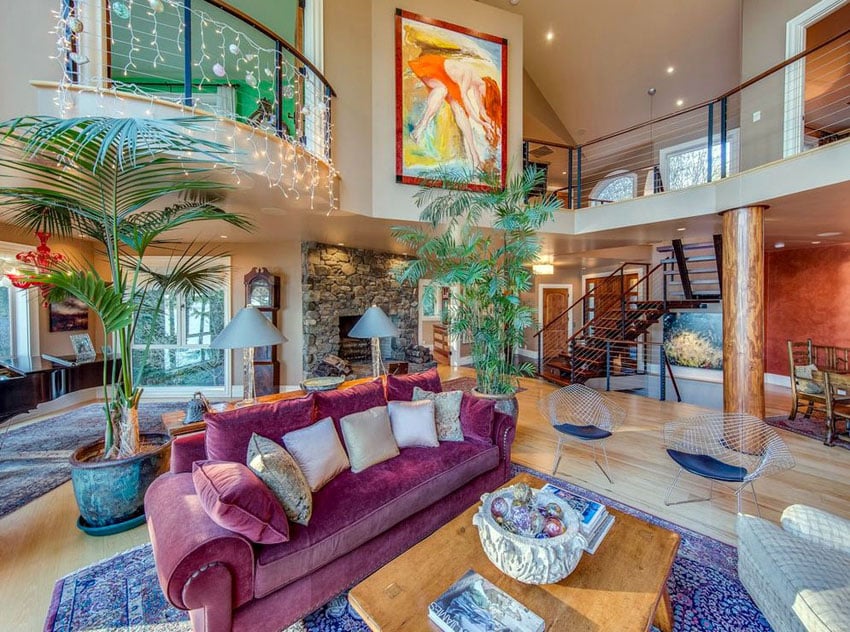 Colorfully decorated sunken living room with balcony