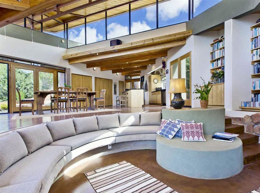 Contemporary sunken living room with large sectional couch