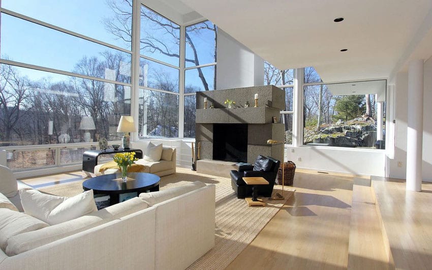 Modern sunken living room with white oak floors and fireplace