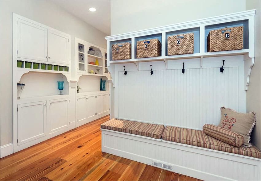 Mud room with bench seating and cubby shelving