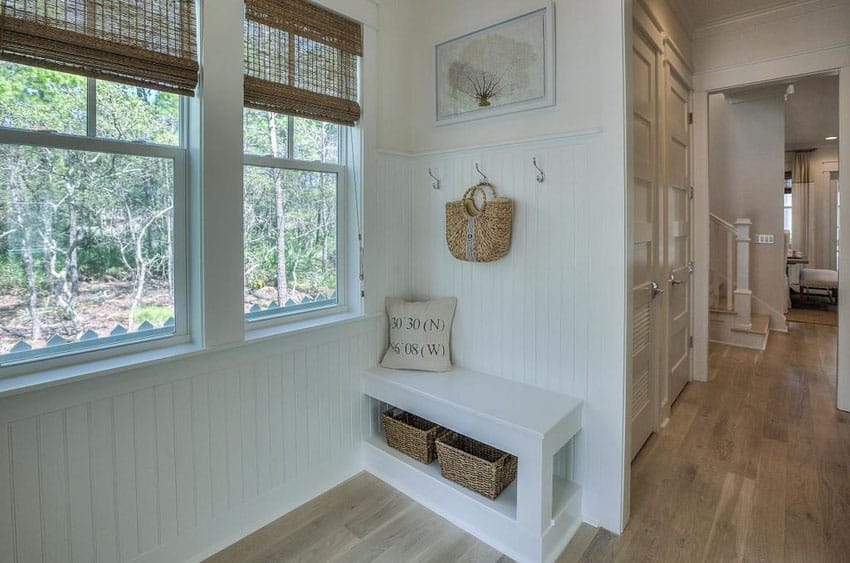 Small cottage mudroom bench and under seat cubbie storage