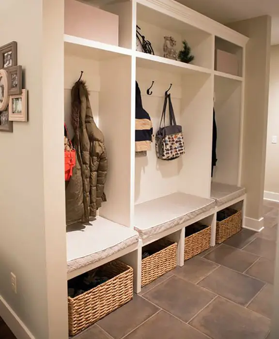 Space with wicker basket storage with shelves and hooks 