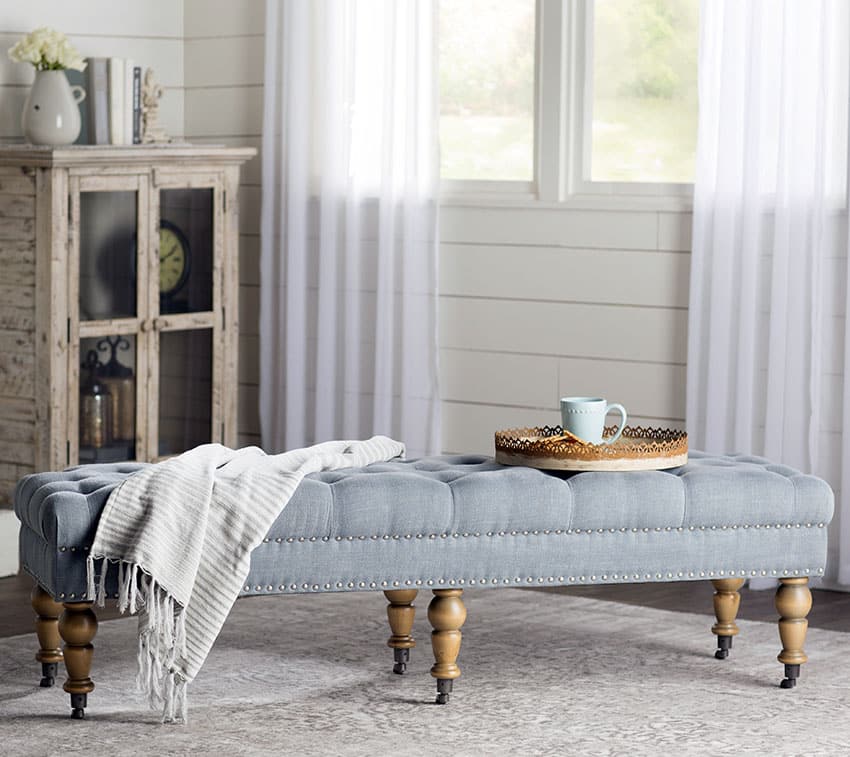 Tufted bedroom bench with traditional wooden legs
