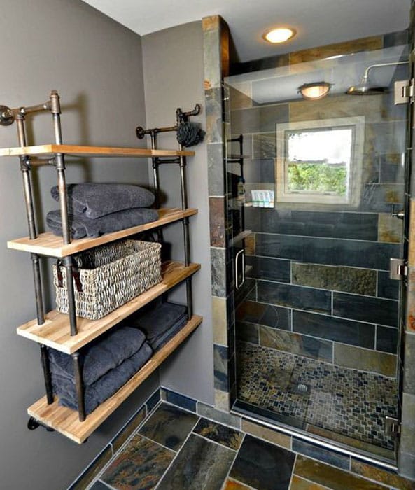 Bathroom with French factory shelving and mosaic floor tiles