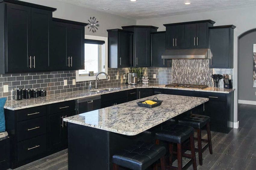 Contemporary kitchen with black cabinets, island and giallo verona granite counters