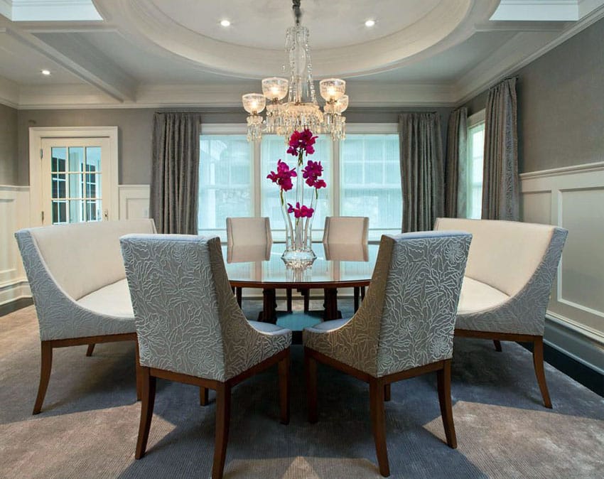 Gray and beige two tone dining room with carpet