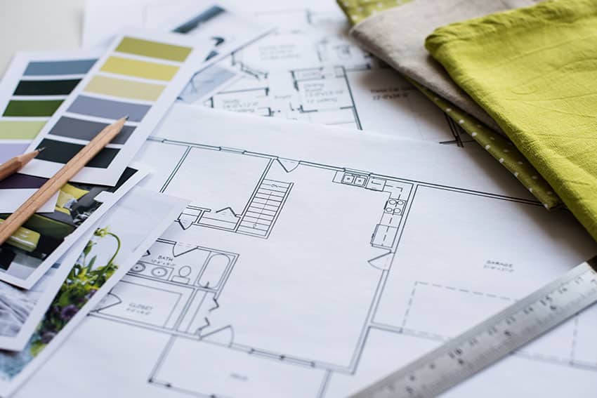 Interior design planning with color chart and blueprint