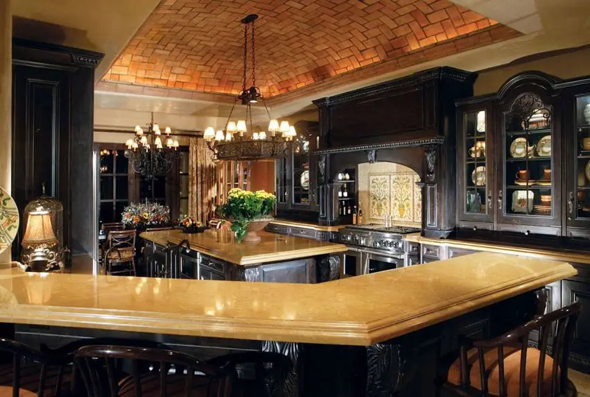 Kitchen with brick vaulted ceiling, glossy counter and dark wood base 