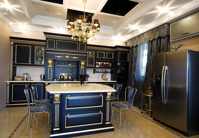 Kitchen with Giallo Reale marble flooring and navy and gold cabinets