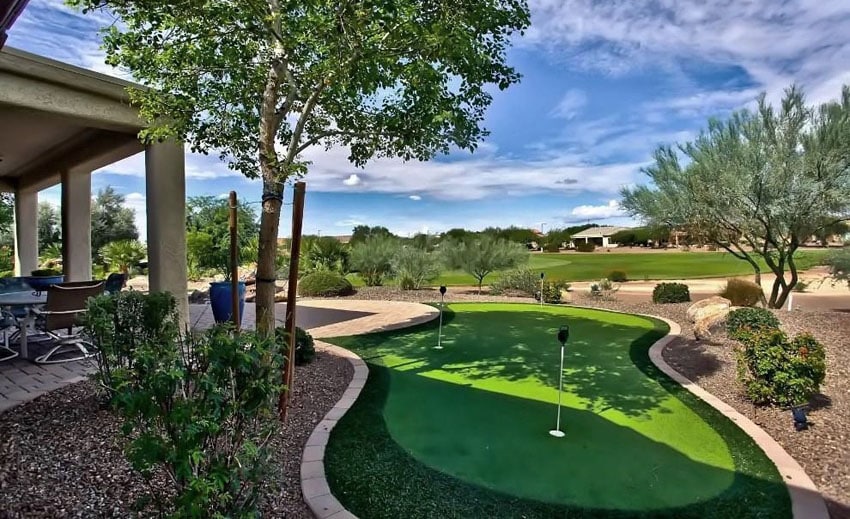 Luxury backyard with shady putting green