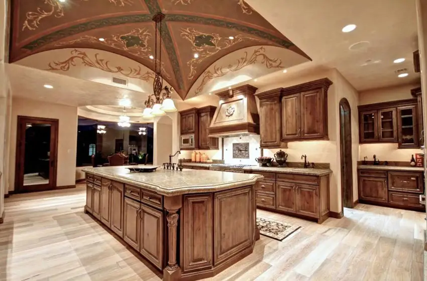 Kitchen with dome ceiling with painted motifs and oatmeal painted walls 