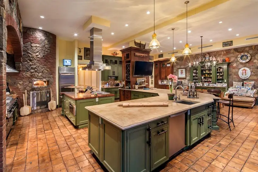 Kitchen with limestone countertops and rustic brick pizza oven
