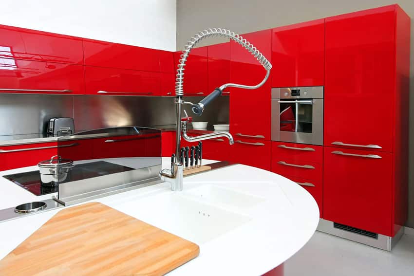 modern-kitchen-with-european-style-red-cabinets-and-white-countertop